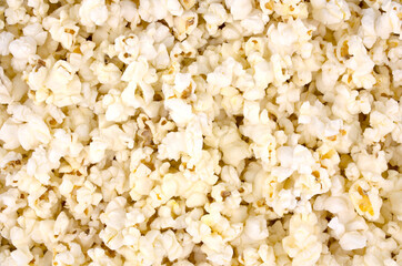 Scattered salted popcorn, texture background