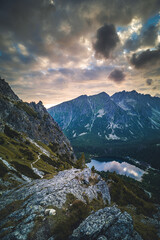 Obraz na płótnie Canvas Sunset panorama in High Tatras mountains national park. Mountain popradske lake in Slovakia.