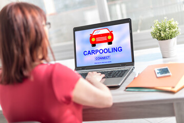 Carpooling concept on a laptop screen