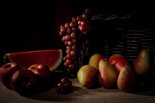 still life with pears apples and watermelon