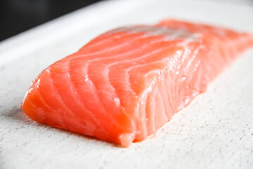 Salmon steak on a cutting board