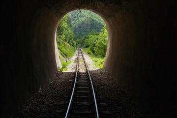 Fototapeta na wymiar Old railway tunnel on Narrow-gauge railway, Tourist Attraction, old-fashioned travel