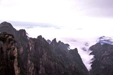 Naklejka na ściany i meble Wonderful and curious sea of clouds and beautiful Huangshan mountain landscape in China.
