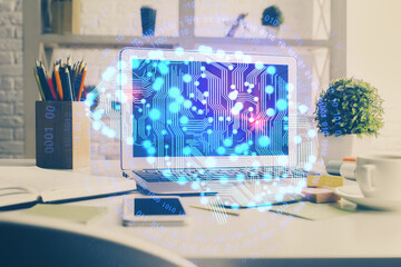 Double exposure of work space with computer and human brain drawing hologram. Brainstorm concept.