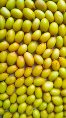 Close up full frame macro photo of neem fruits