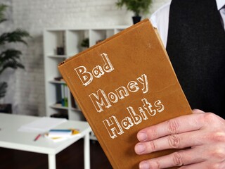 Financial concept about Bad Money Habits with inscription on the sheet.