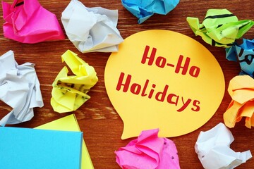 Business concept about Ho-Ho-Holidays with sign on the page.