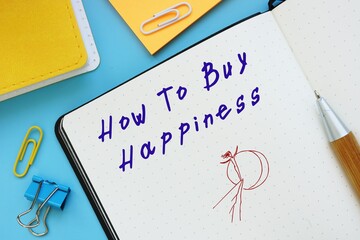 Business concept about How To Buy Happiness with sign on the sheet.