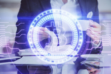 Man's hands working with notes background. Cryptocurrency and finance concept.