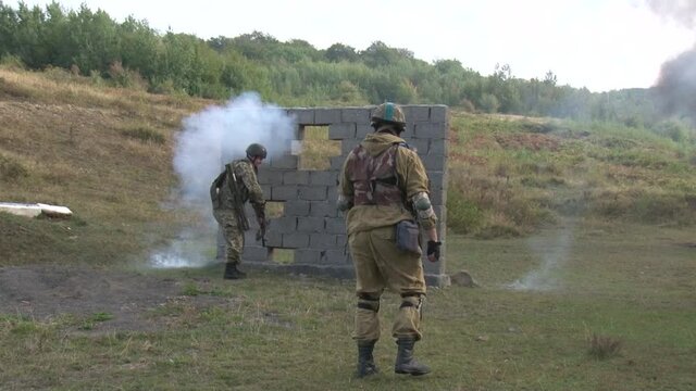 military exercises in the field of machine gun fire.