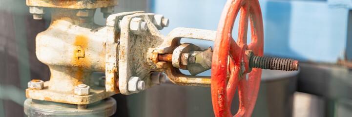 red crane on oil rig close up