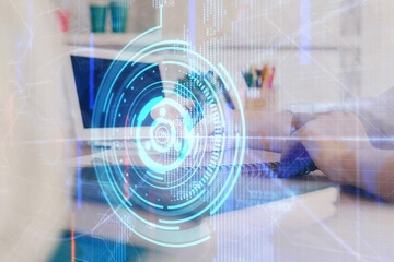 Multi exposure of woman hands on background with technology coding hologram. Data concept.