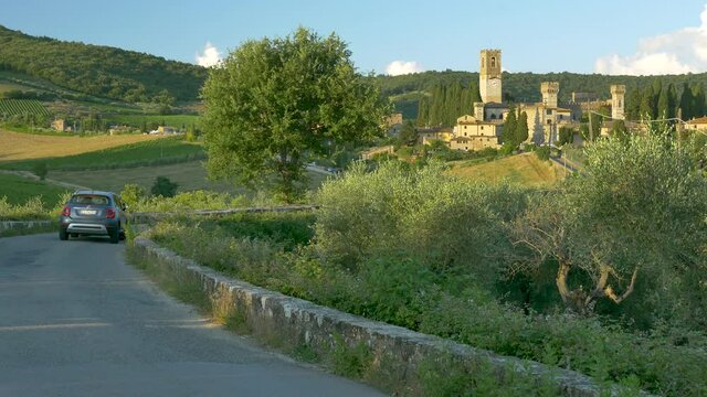 Badia a Passignano, Florence, Italy - 2020, June 20: The ancient medieval village Badia a Passignano, with the historic Abbey of San Michele Arcangelo. Tuscan landscape.
