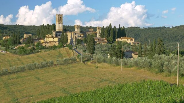 Badia a Passignano, Florence, Italy - 2020, June 20: The ancient medieval village Badia a Passignano, with the historic Abbey of San Michele Arcangelo. Tuscan landscape.
