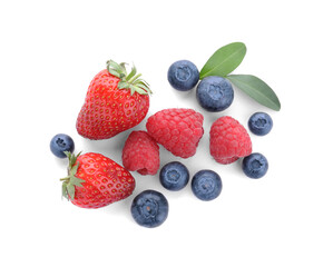 Mix of different fresh berries isolated on white, top view