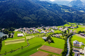 Fototapeta na wymiar Poschiavo valley, Switzerland, aerial view of the village of Le Prese