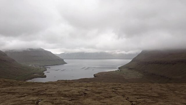 Aerial view sliding camera to Faroe Islands fjord