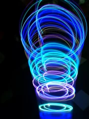 Fototapeten Fraktale Wellen glowing neon light  © Irfankhan