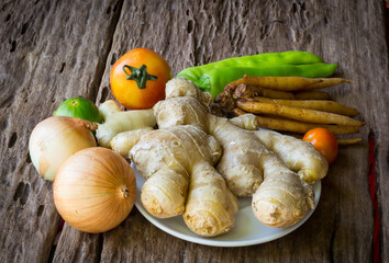 Vegetables on the wooden still life Clear focus on specific areas of the image./ soft Focus
