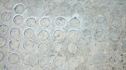 Many circle sign pattern on the ground oncement concrete surface for background backdrop

