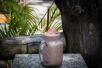 Naklejka premium iced cocoa in a glass