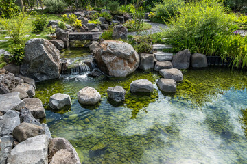 Small waterfall in the Japanese garden - 363824557