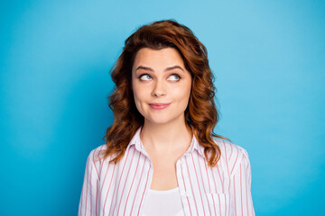 Closeup photo of pretty charming wavy lady dreamer look side up empty space intelligent creative person wear white striped shirt isolated bright blue color background