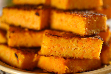 slices of baked pumpkin pie at the plate close up