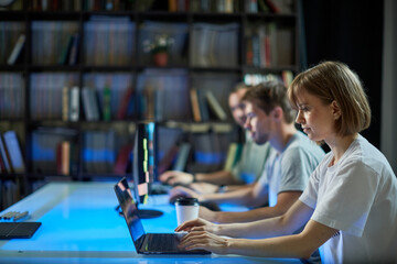 Team of professional programmers engineers write code for the game working on new project, photo for ad IT technology