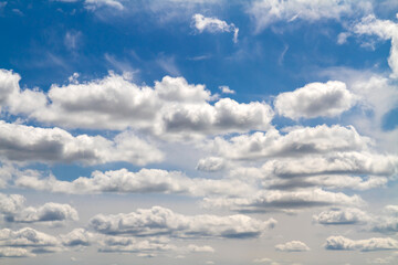Fototapeta premium Blue sky background with white clouds