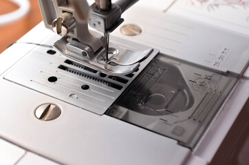 Making a medical black mask with your own hands at home. DIY protective mask. Black mask on a white background. Cotton mask