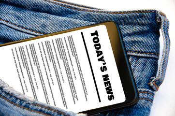 White screen smartphone in jeans pocket. Smartphone place for text. Smartphone in a pocket on a...
