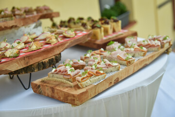 Mini canapes with cheese vegeteble a sausage