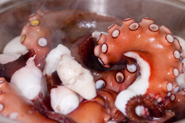 Close up of octopus tentacles baking in the pot