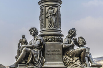 Fototapeta na wymiar Statue of Ernst Friedrich August Rietschel (famous German sculptor) on the Bruhl Terrace in Dresden, Germany.