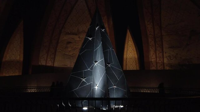 This is a night shot of Pakistan's Landmark called the Pakistan Monument