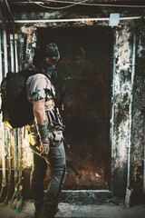 Man walking around in the post apocalyptic and ruined city.wasteland concept.