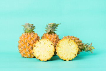 Fresh pineapple fruit on pastel green background, Tropical fruit
