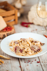Fettuccine pasta with brisket pastrami cream sauce