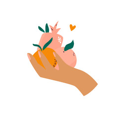 Female hand holding different fruits orange, pomegranate, peach.