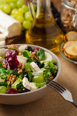 Italian spring salad with goat cheese, grapes and walnuts. Served with croutons.