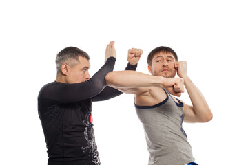 Two fighters sparring, full length isolated on white background