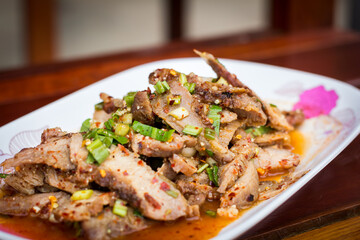 Thai food name is Grilled pork with spicy salad, Thai food