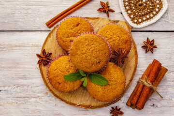 Homemade cupcakes with cinnamon, star anise and fresh mint. Autumn good mood, warm weather