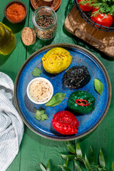 Manti on a blue plate. Close-up shot in the decor