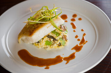 Pan roasted Cajun seasoned salmon fillet. Served with rice pilaf, organic steamed vegetables, bell peppers, squash, carrots and zucchini. Classic American diner lunch favorite.