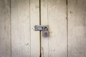 Locked padlock with at door