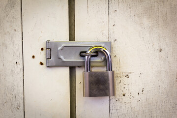 Locked padlock with at door