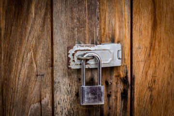 Locked padlock with at door