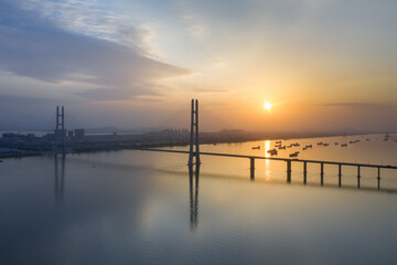 Fototapeta na wymiar jiujiang second bridge in sunset